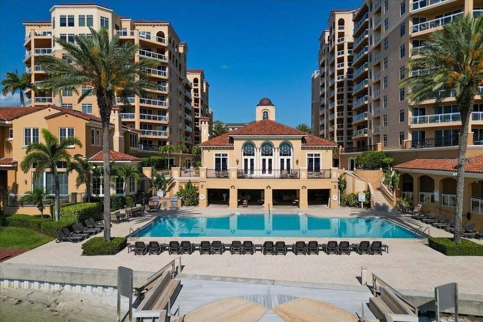 Heated pool and lanai under clubhouse.