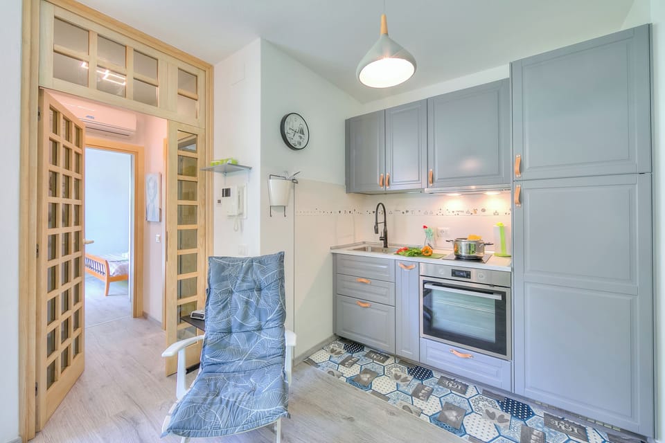 Family Apartment, Multiple Bedrooms (Marina's Green Home) | Private kitchen | Fridge, microwave, oven, stovetop