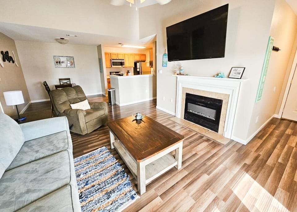 Condo, Multiple Beds, Balcony | Living area | 50-inch flat-screen TV with cable channels, TV