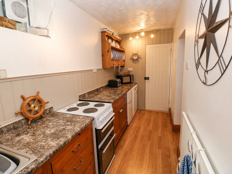 Fridge, dishwasher, electric kettle, toaster