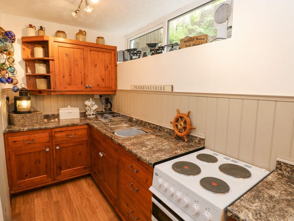 Fridge, dishwasher, electric kettle, toaster