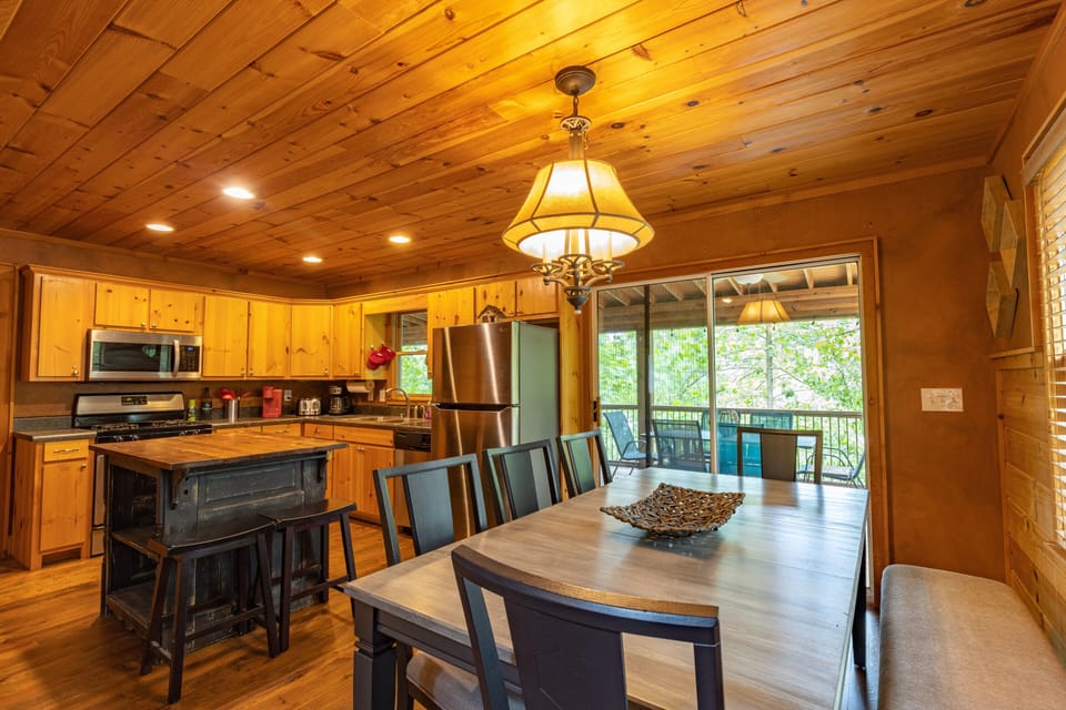 Table for 8, with seating for 6 on the deck just outside.