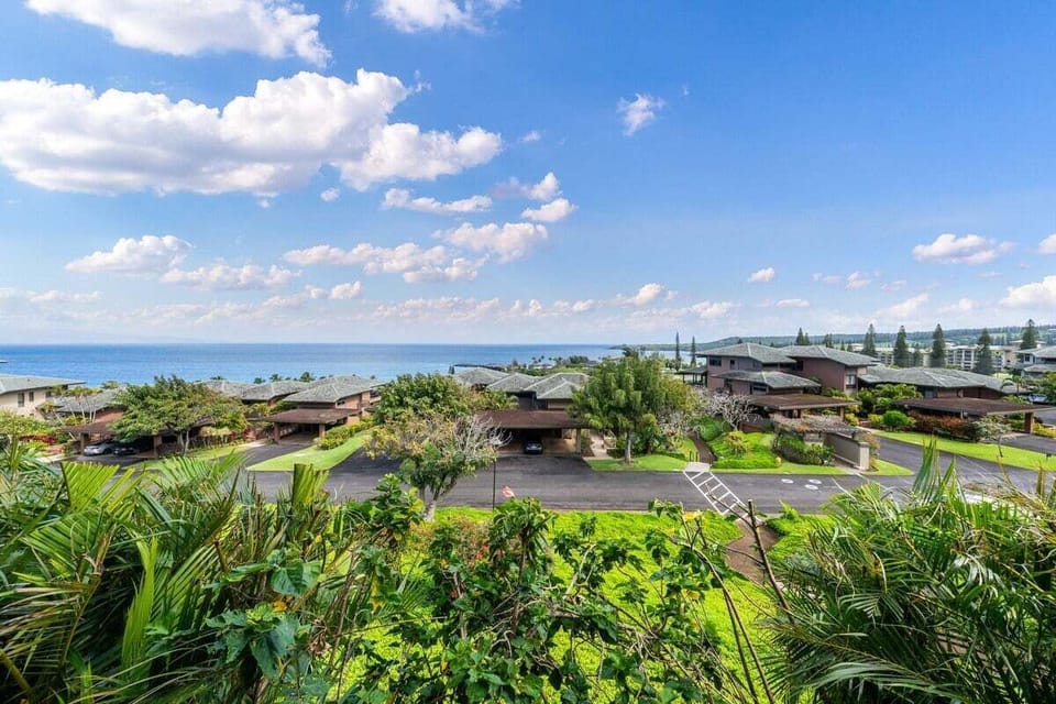 Vibrant ocean and landscape vistas featuring tropical foliage and wide open skies from the villa's outdoor spaces.