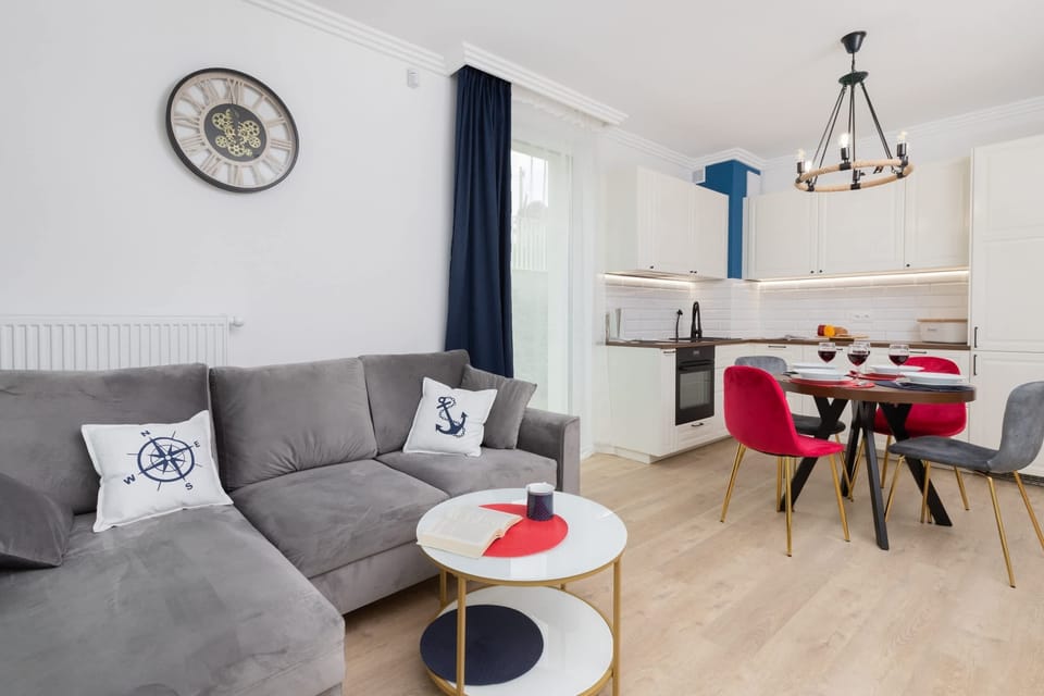 The comfortable sofa bed in the living room provides extra sleeping space. 