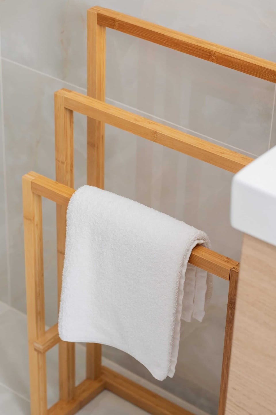 The bathroom's contemporary decor complements the apartment's style. 