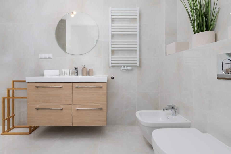 The bathroom's stylish design provides a relaxing environment. 