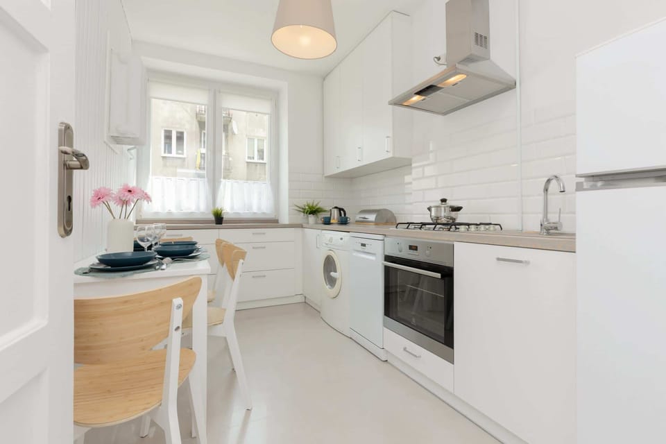 The kitchen is fully equipped with all necessary appliances and utensils. 