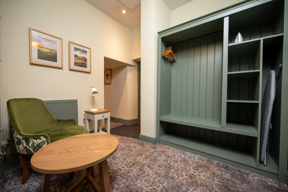 Family Room | Desk, blackout drapes, iron/ironing board, free WiFi