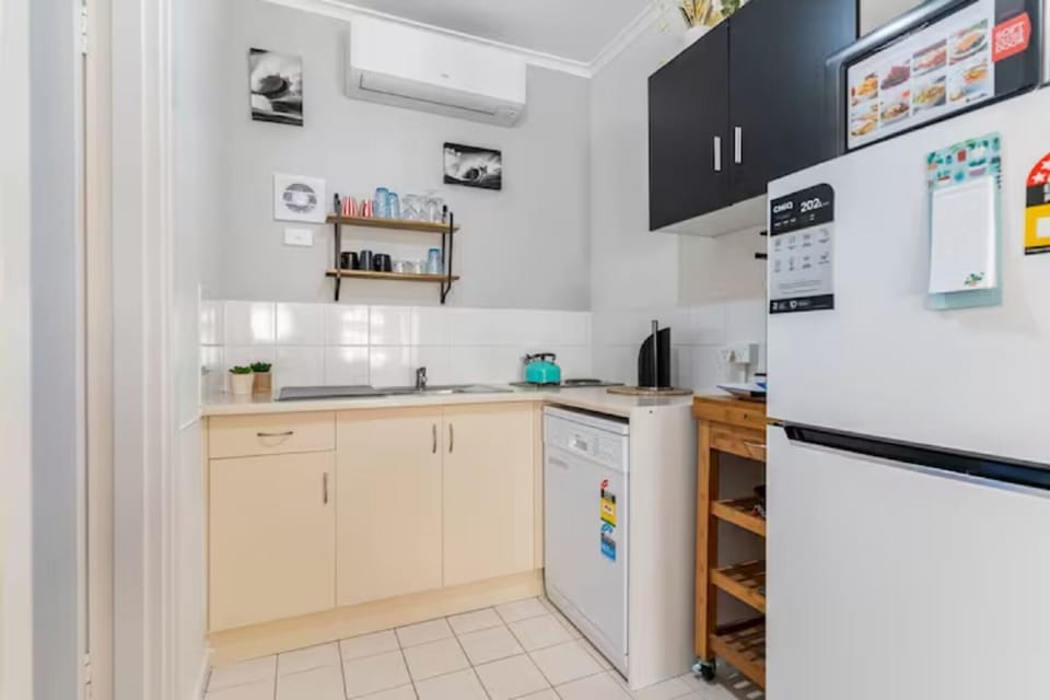 Kitchenette is complete with everything you need to cook or serve meals