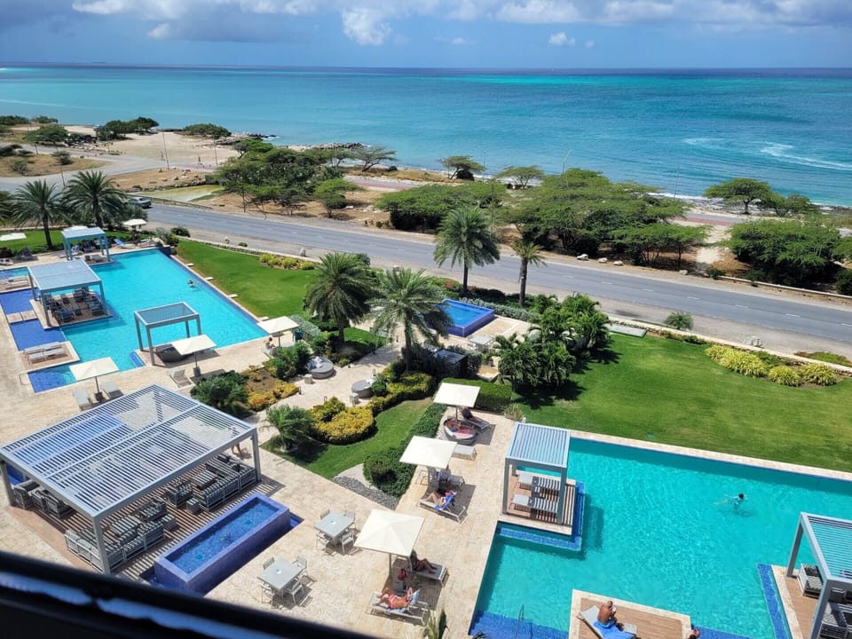 Luxury Resort-Style Pool with Ocean Views in Aruba with 2 saltwater pools