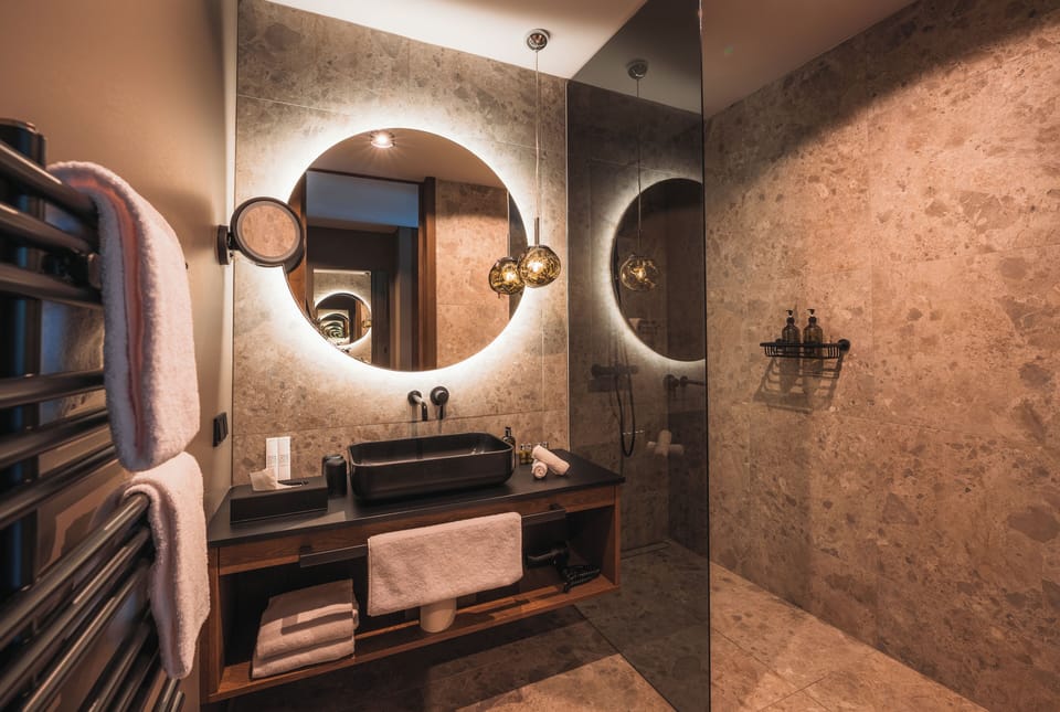 Superior Suite, 2 Bedrooms | Bathroom | Shower, free toiletries, hair dryer, bathrobes