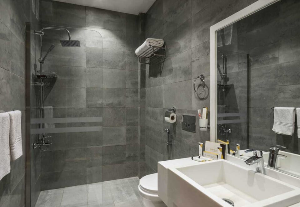 Superior Room | Bathroom | Deep soaking tub, hydromassage showerhead, hair dryer, bathrobes