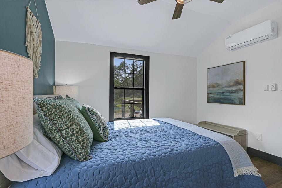View looking out into bedroom 2 from bathroom 2.