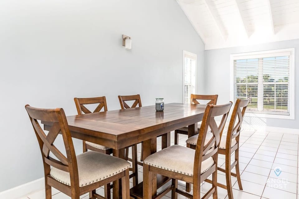 Bright dining area filled with natural light.