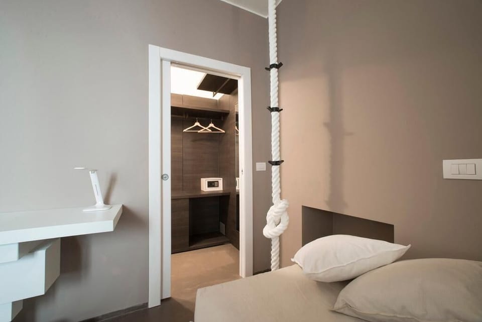 Superior Quadruple Room | Down comforters, minibar, individually decorated, individually furnished