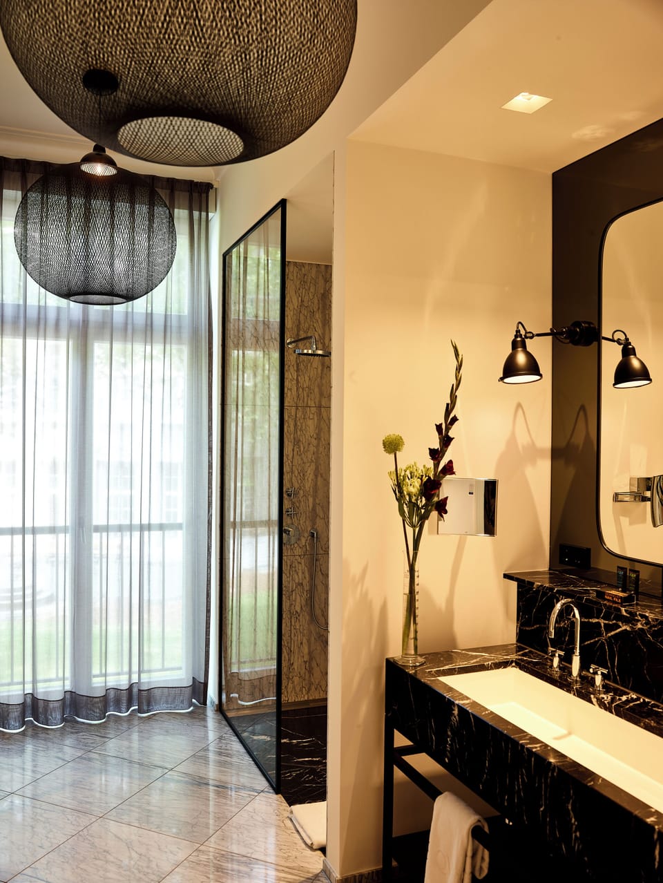 Rainfall showerhead, eco-friendly toiletries, hair dryer, slippers