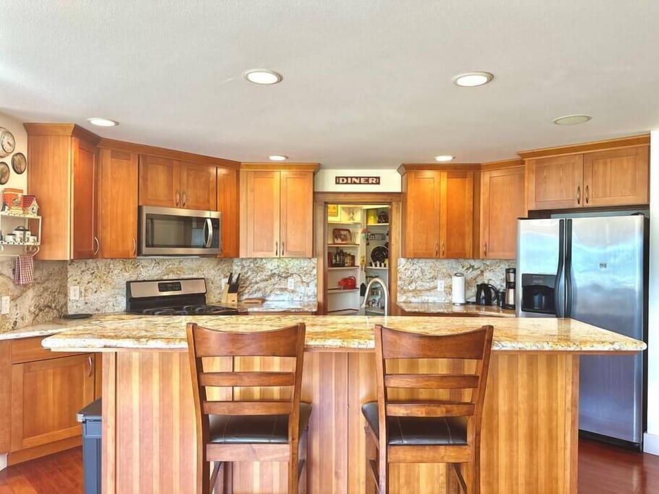 Complete kitchen setup with dishes, cookware, spices and all essentials. 