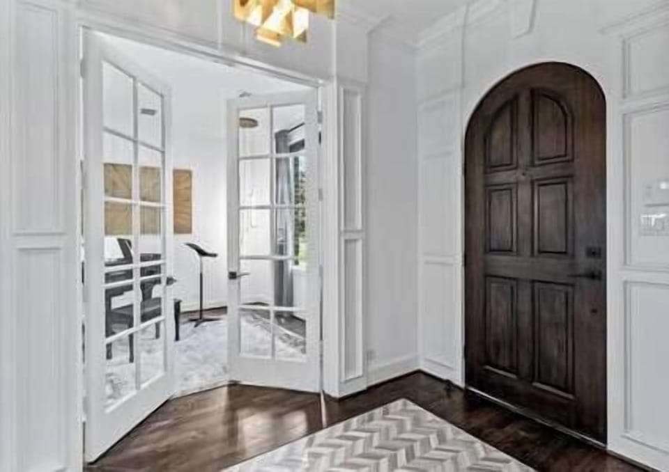 Music room with grand piano and music stand