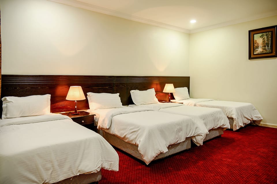 Pillowtop beds, blackout drapes, free WiFi, bed sheets