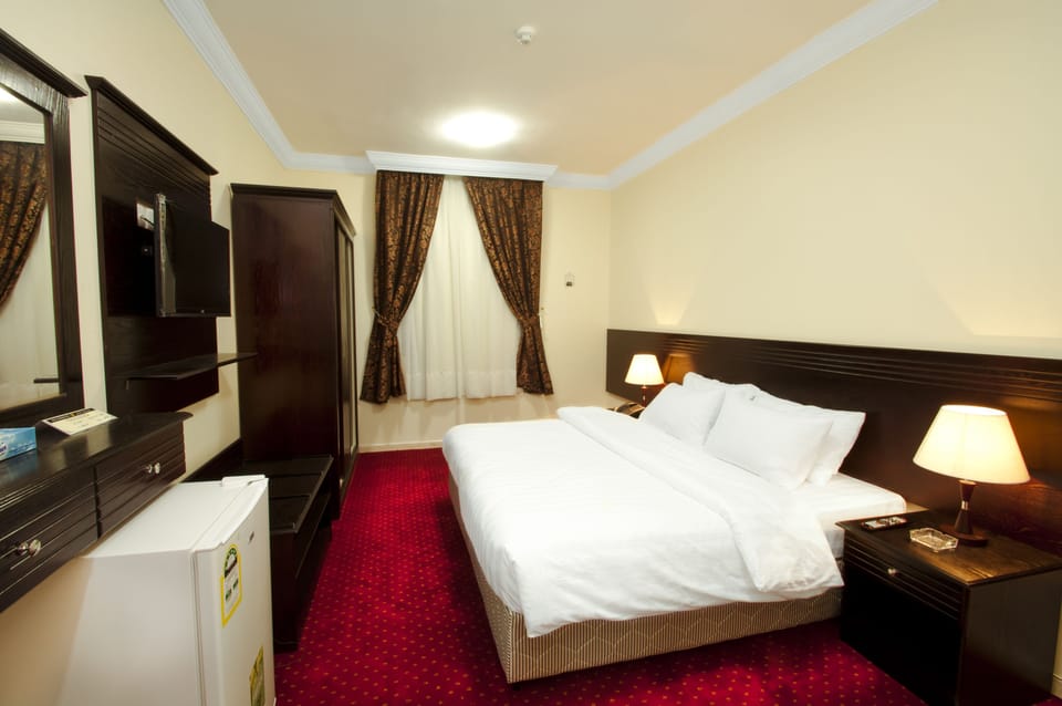 Pillowtop beds, blackout drapes, free WiFi, bed sheets