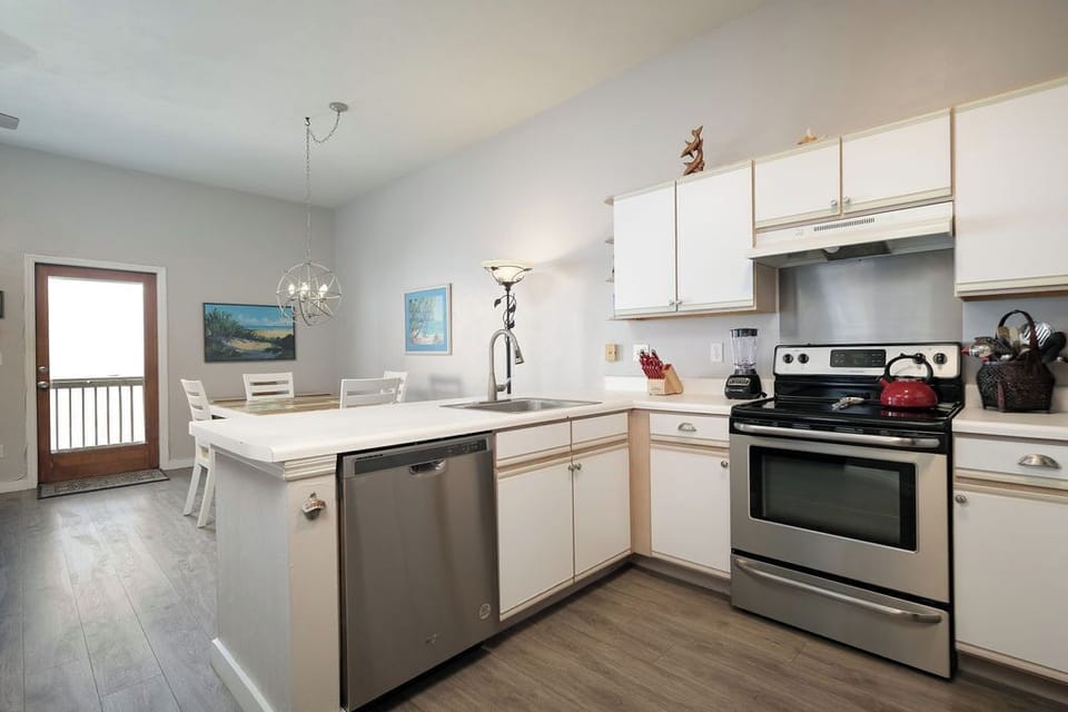 Fully Stocked Kitchen Equipped with Dishwasher