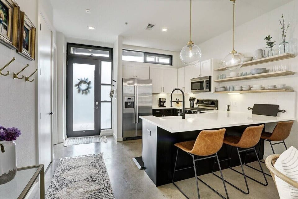Cook, sip, and savor the moment. Your chic Austin escape with open, social space.