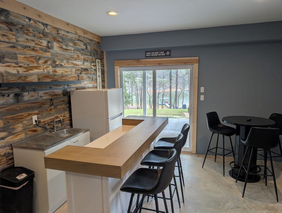 Bar area in walk out basement with lake view.