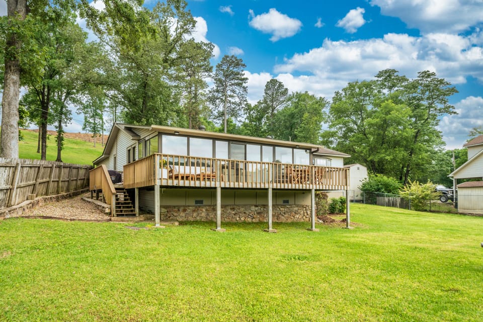 Back patio and yard, view looking from the lake
