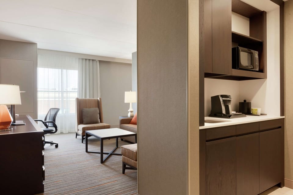 Suite, 1 King Bed, Non Smoking | Premium bedding, in-room safe, individually furnished, laptop workspace