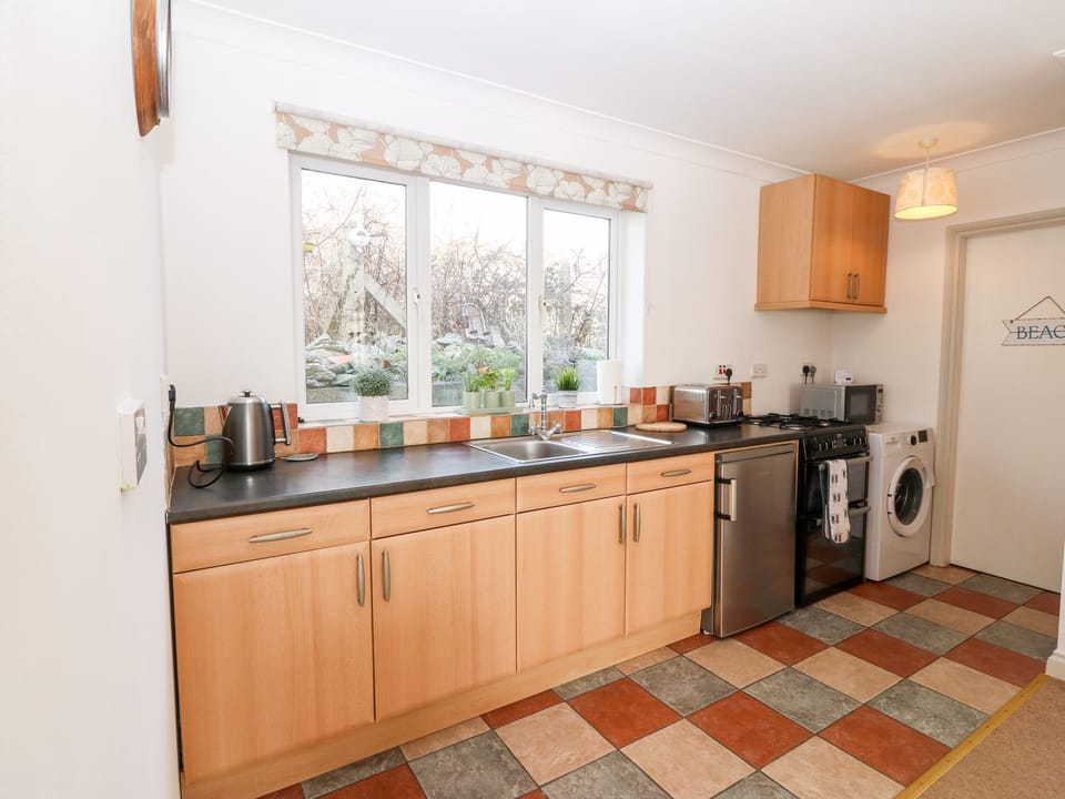 Fridge, electric kettle, toaster, cookware/dishes/utensils