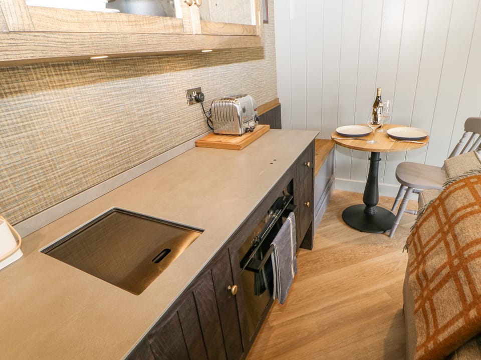 Fridge, electric kettle, cookware/dishes/utensils