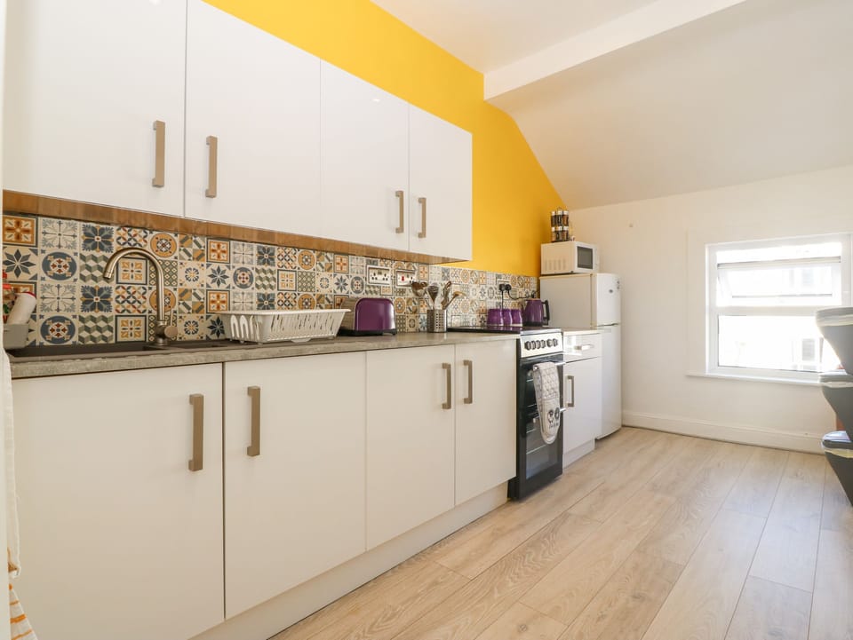 Fridge, electric kettle, toaster, cookware/dishes/utensils