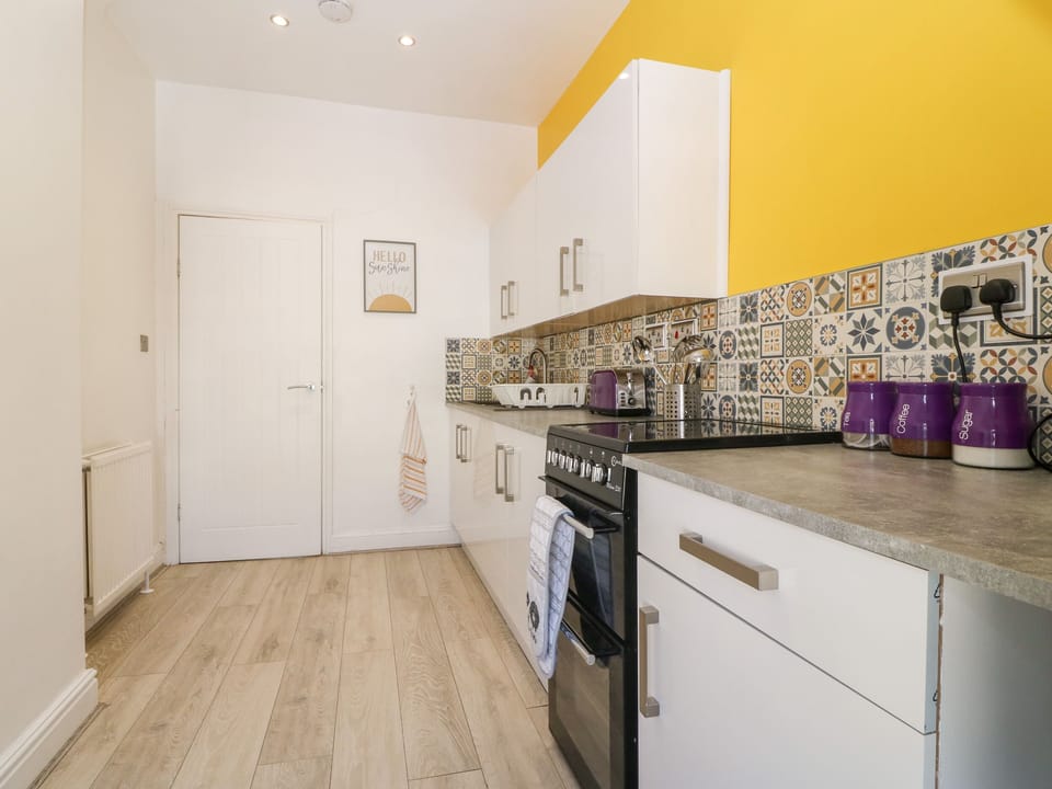 Fridge, electric kettle, toaster, cookware/dishes/utensils