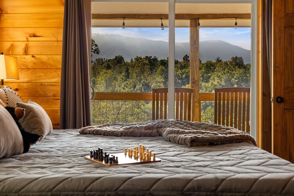 Bedroom 1: Lay back and let nature greet you through the window.