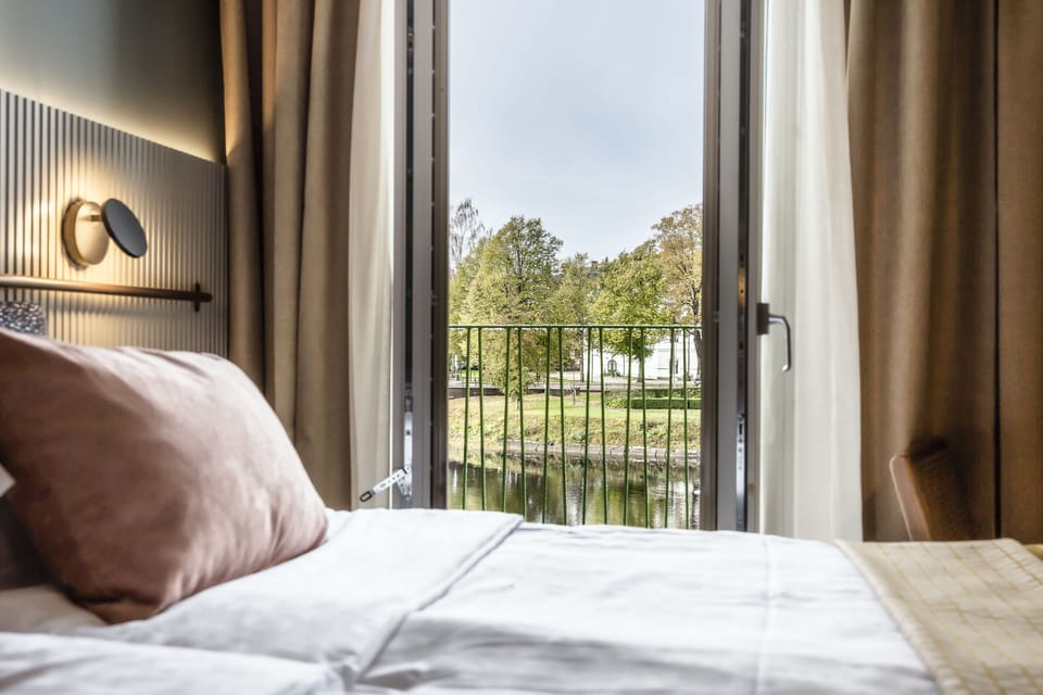 Superior Double Room, River View | Premium bedding, minibar, in-room safe, blackout drapes