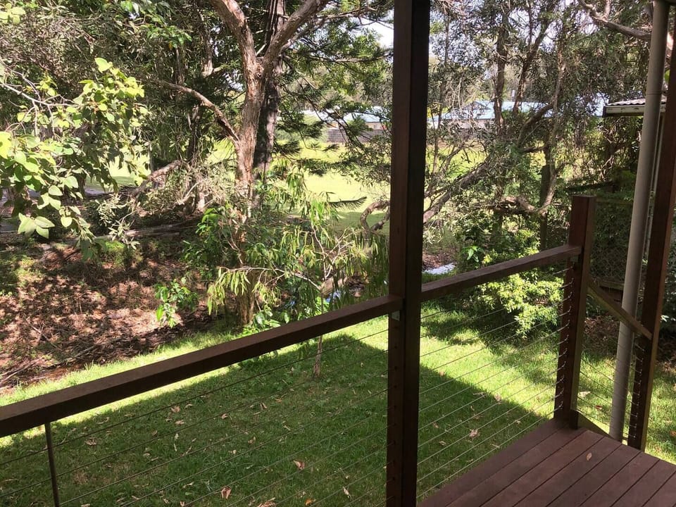 Leafy private aspect from the open plan living space and private deck. Garden surrounding house is also private.