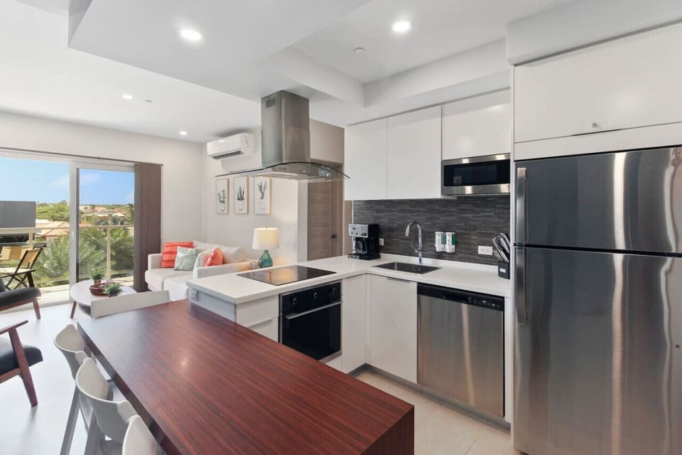 The kitchen is fully furnished with state-of-the-art cooking utensils, making it perfect for cooking any meal, from a quick breakfast to a three-course gourmet dinner.