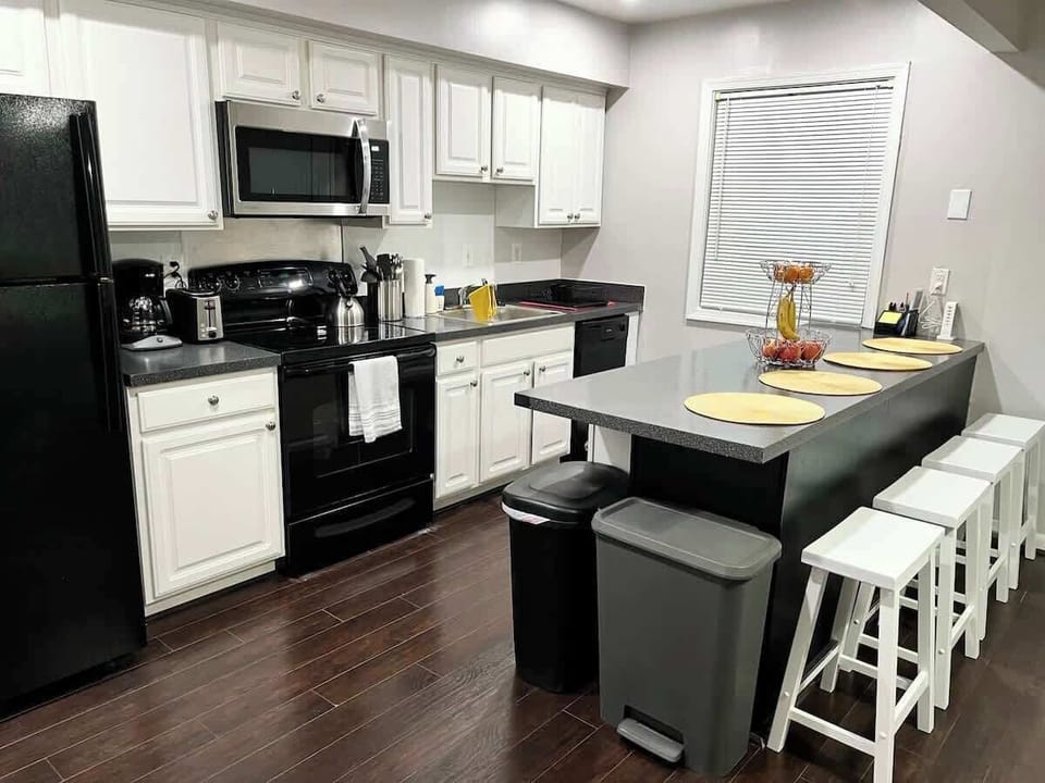 Enjoy making a meal in this fully equipped kitchen with a large island that seats 4 