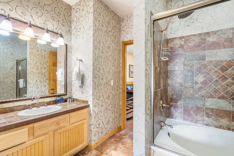 Main Level Bathroom with a Shower/Tub Combo