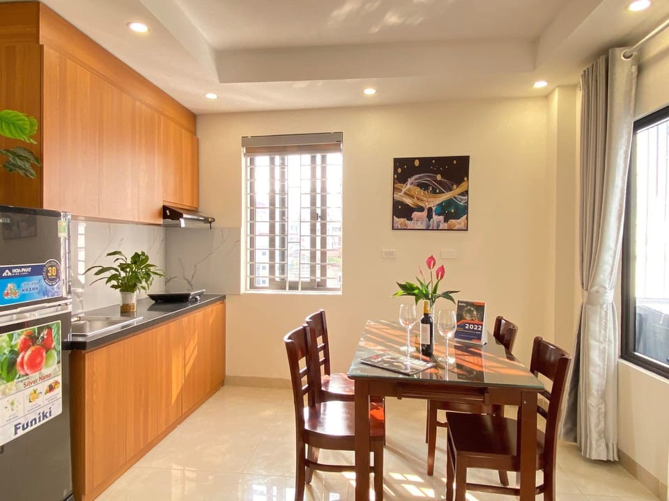 Basic Apartment | Private kitchen | Fridge, stovetop