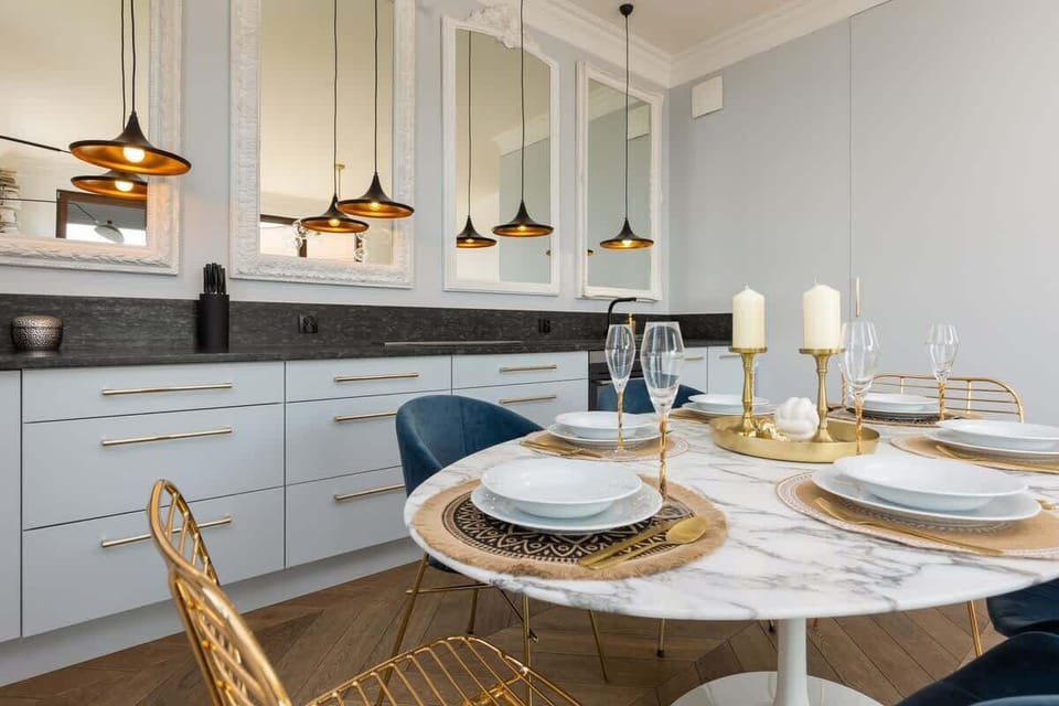 Fully equipped kitchenette with a dining table.