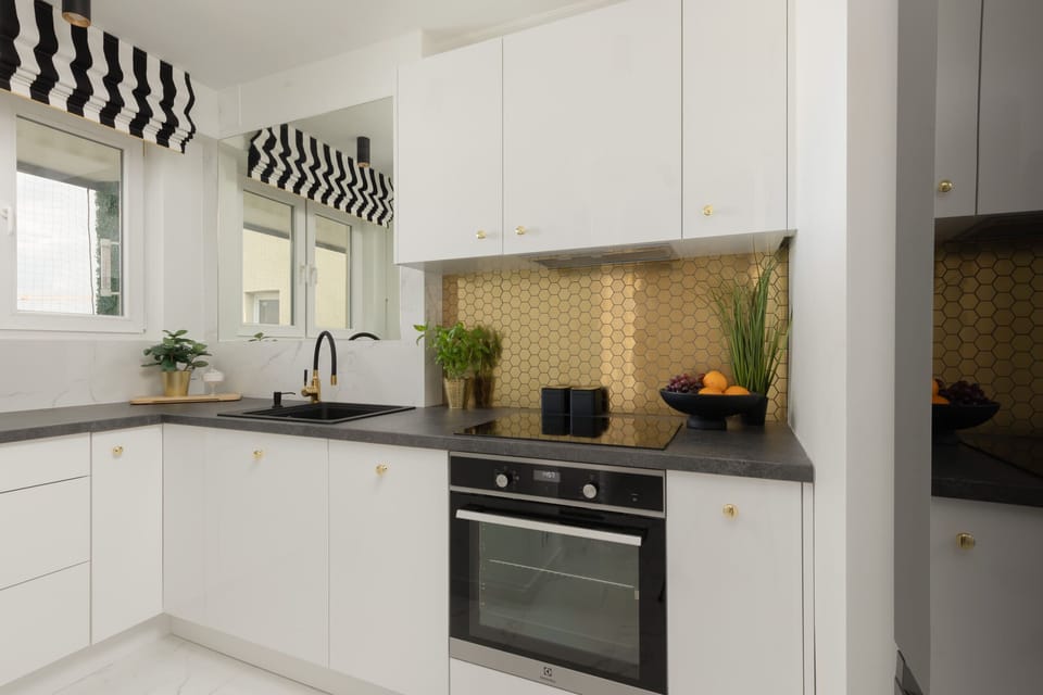 The kitchenette's practical layout maximizes space and functionality.