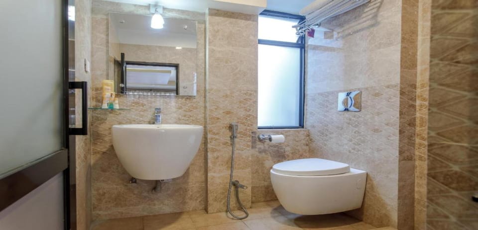 Shower, rainfall showerhead, towels, soap