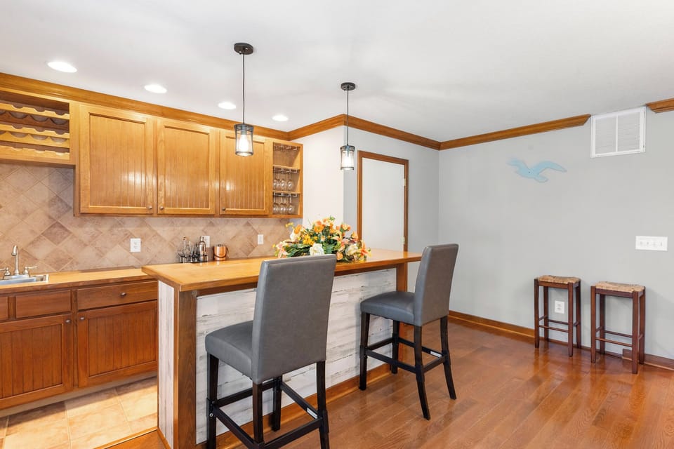 NHA12: Anchors Aweigh | Bottom Level Dining Area with Bar