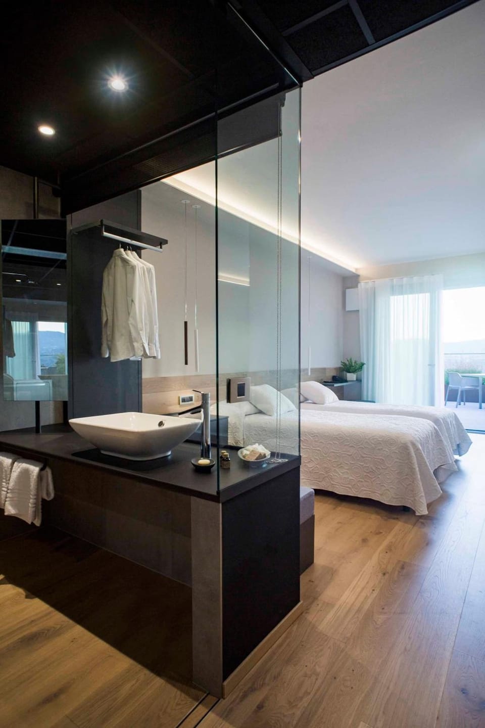 Premium bedding, down comforters, minibar, in-room safe