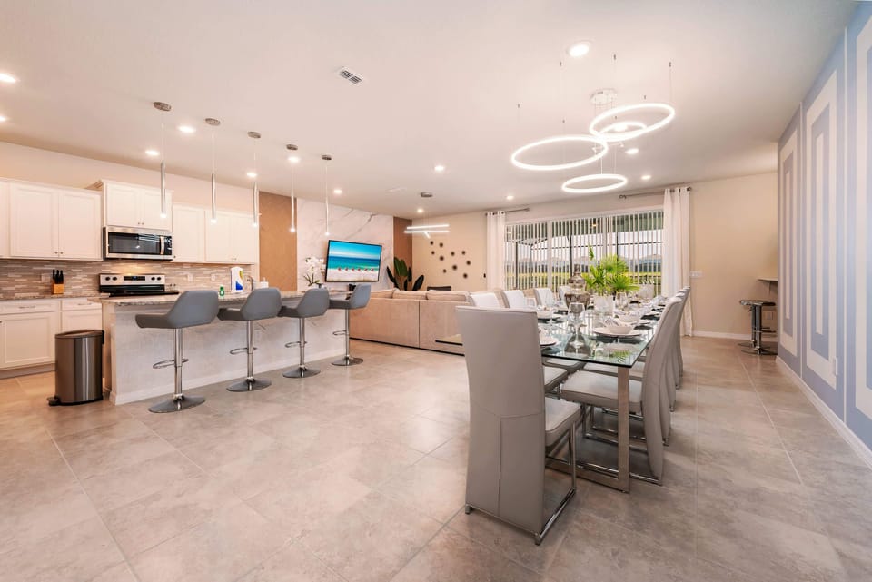 Experience luxury in this expansive open-plan kitchen and dining area, perfect for large gatherings and memorable meals.