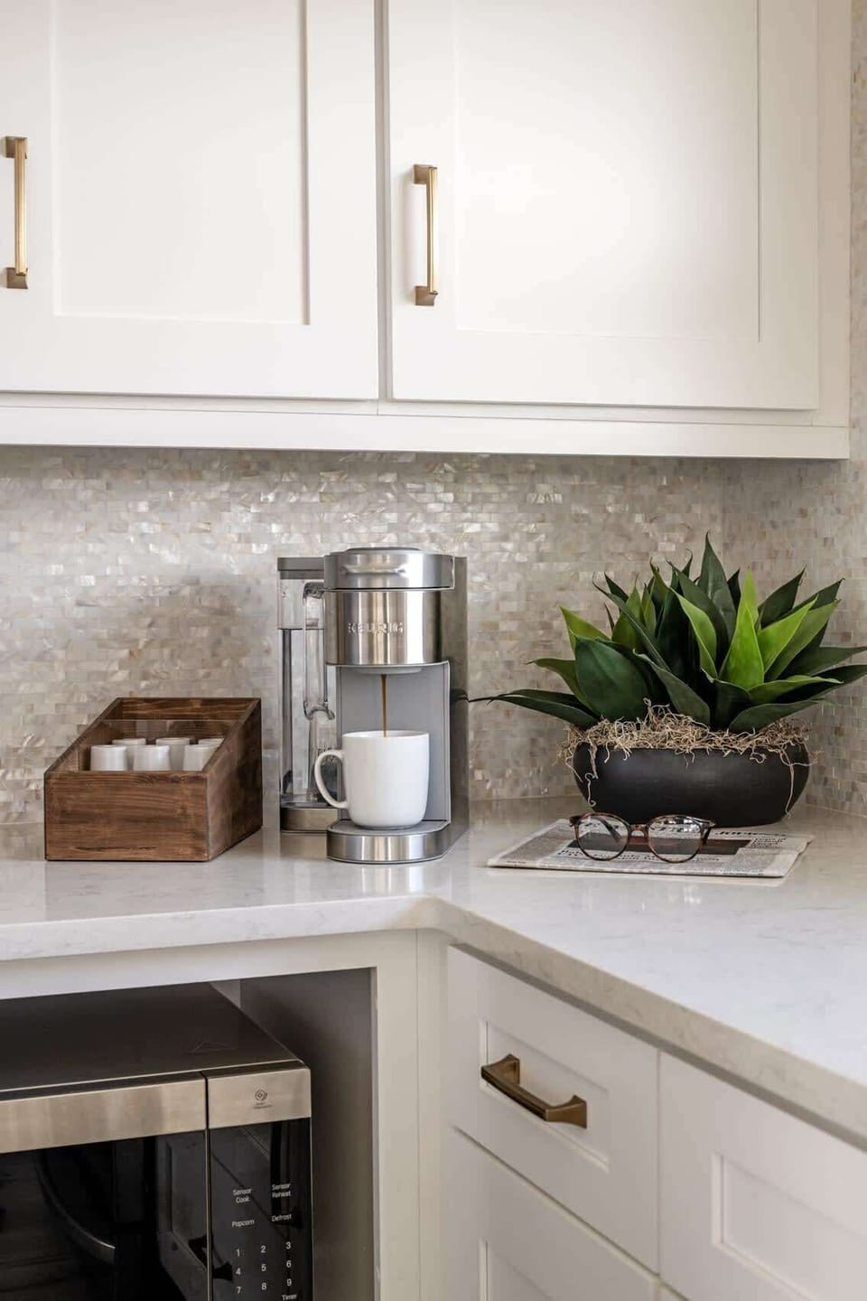 In the heart of the gourmet kitchen at Seashell Escape, a sleek and sophisticated coffee maker awaits, ready to awaken your senses and energize your mornings.