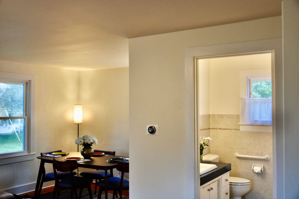 Inviting Dining Area and Spacious Main Bathroom