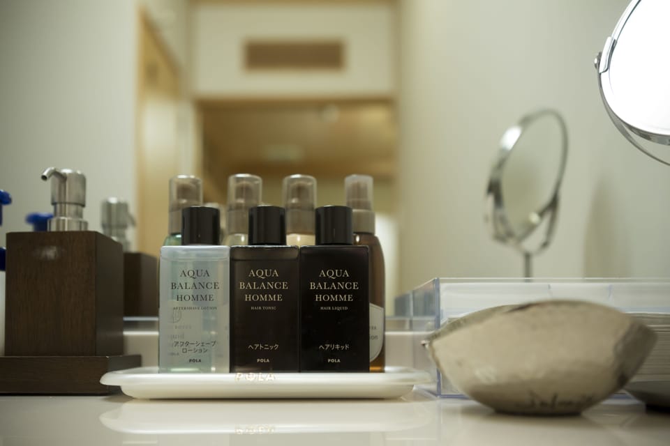 Separate tub and shower, spring water tub, designer toiletries