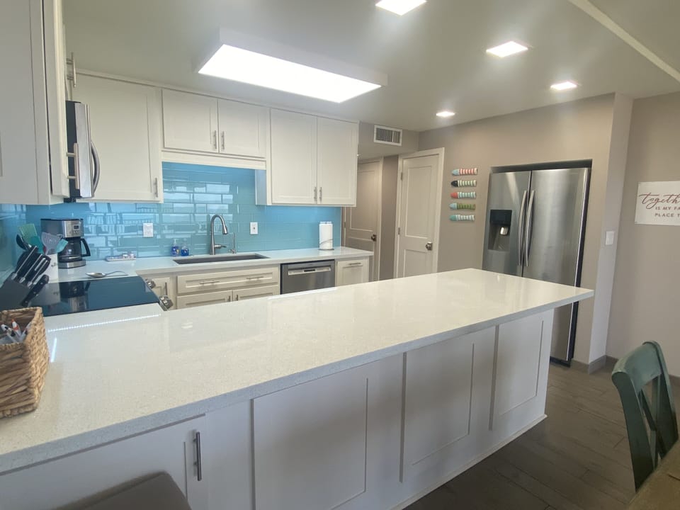 Beautiful Kitchen, with roomy Quartz Countertop.